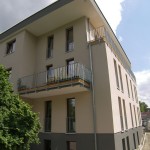 Modernes Mehrfamilienhaus Kosima in Grau