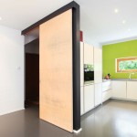 Moderne Küche mit grüner Wand